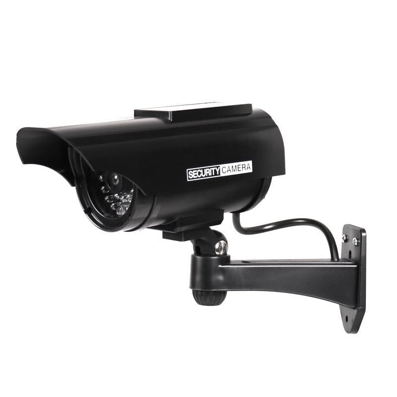 Realistic dummy security camera with blinking light
