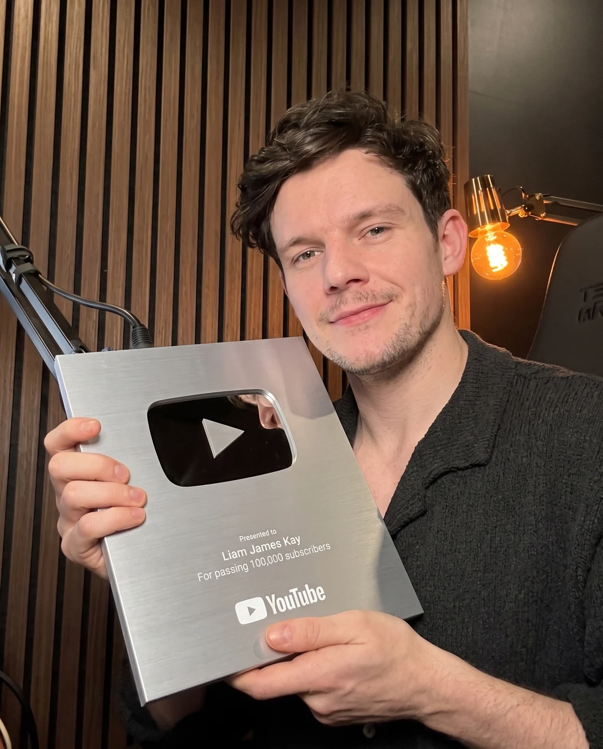 Liam James Kay with his YouTube Silver Play Button