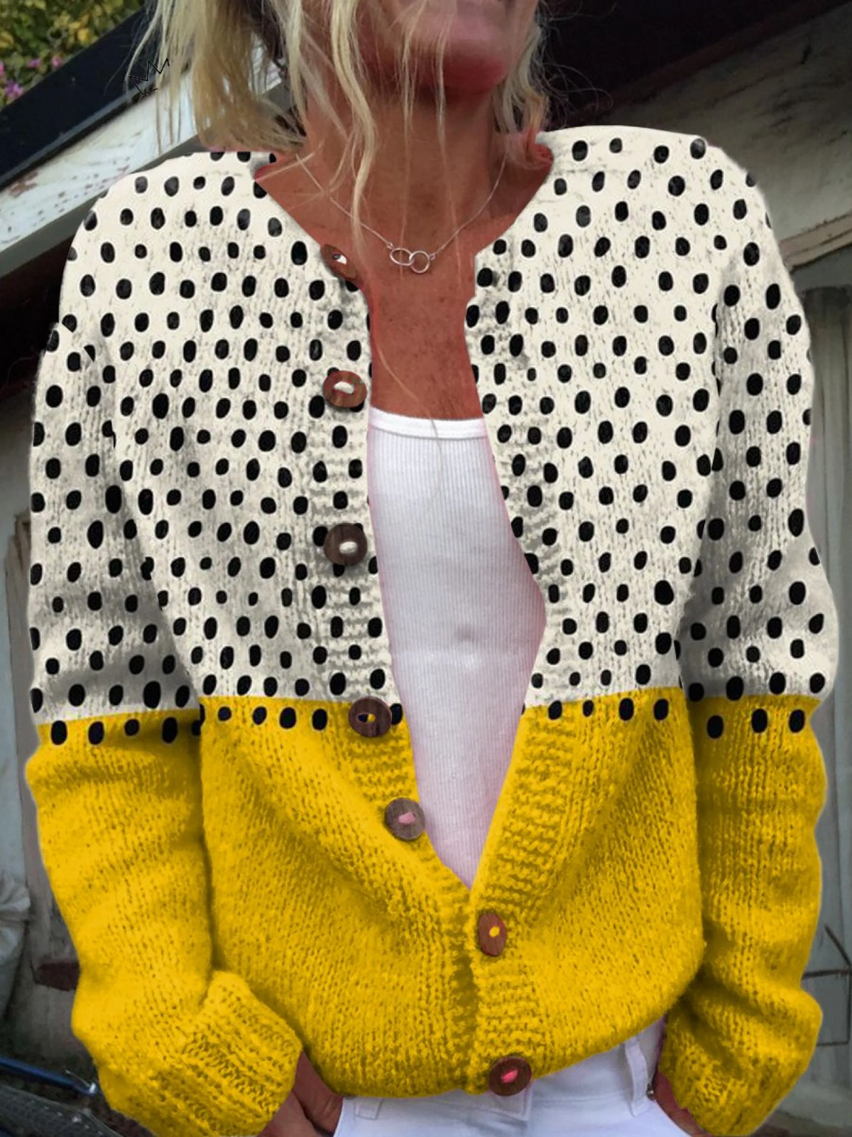 Junella vintage knit cardigan in cream polka dot and mustard yellow, front view worn open