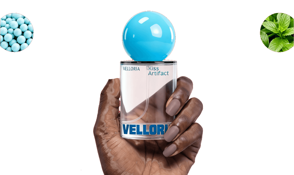 A hand holding the Velloria Kiss Artifact spray