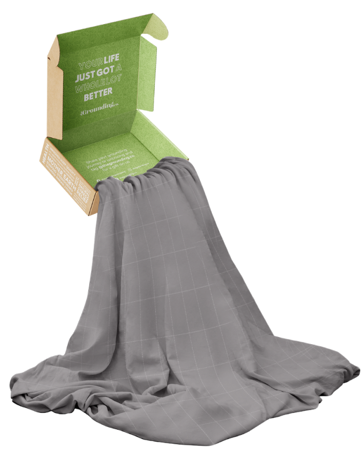 Gray blanket flowing from an open box with green interior.