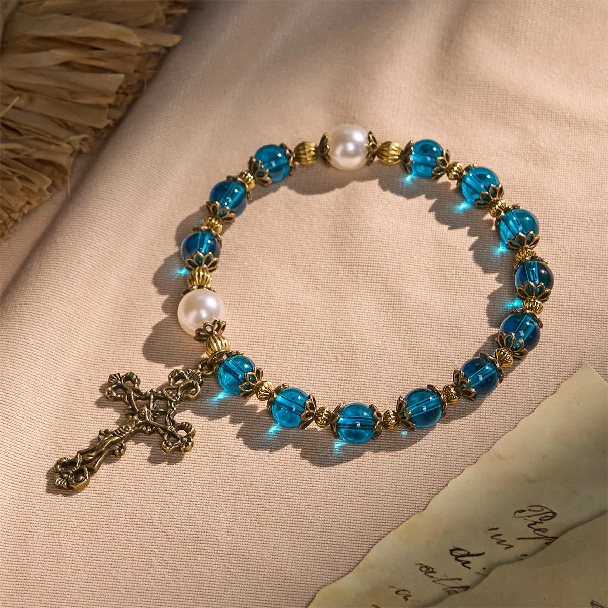 Spiritual Blue Gloss Bead Bracelets Featuring Sacred Brass Crucifix