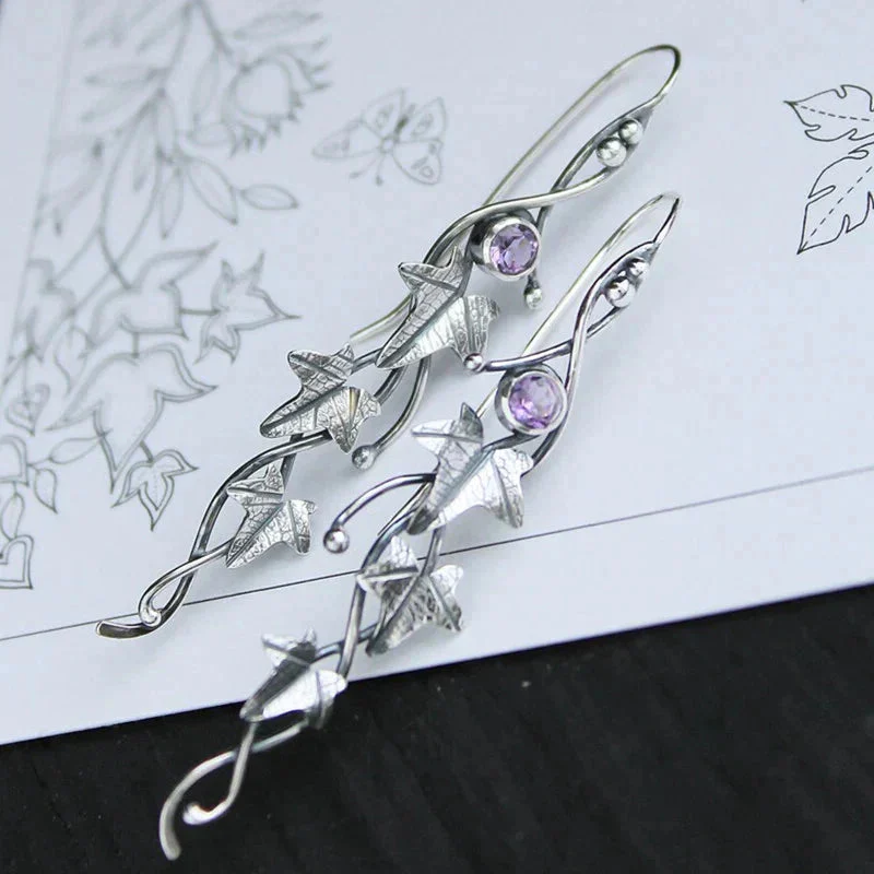 Antique Leaf Elf Earrings | White Gold