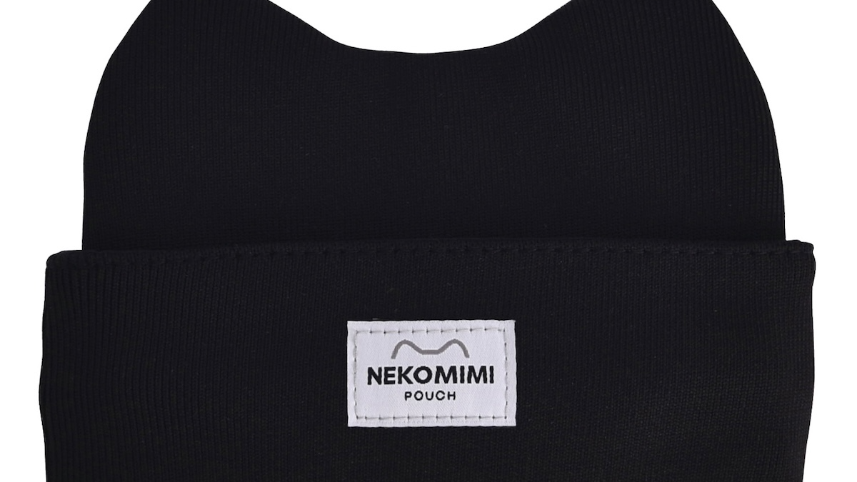 Reference photo of a black notebook pouch with cat-ear tabs